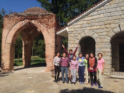 Tourists in front of the Thracian tomb in Kazanlak, Bulgaria