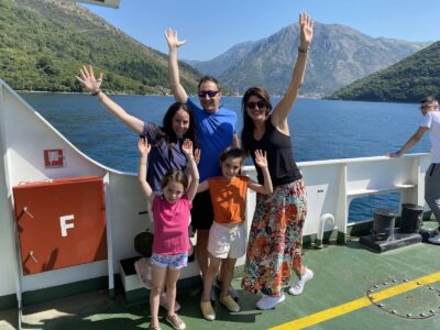 Tourists travelling with a ferry during a Balkan private tour