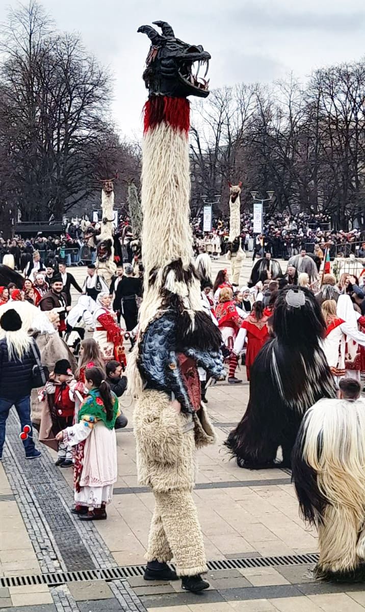 Kukeri with long necks performing at Surva Festival in Pernik, Bulgaria