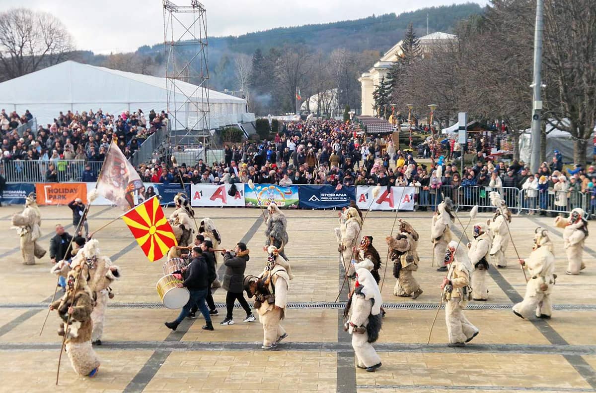 Kukeri from North Macedonia performing at Surva Festival in Pernik, Bulgaria