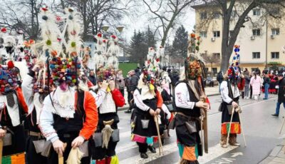 Colorful kukeri waiting at Surva Festival in Pernik, Bulgaria